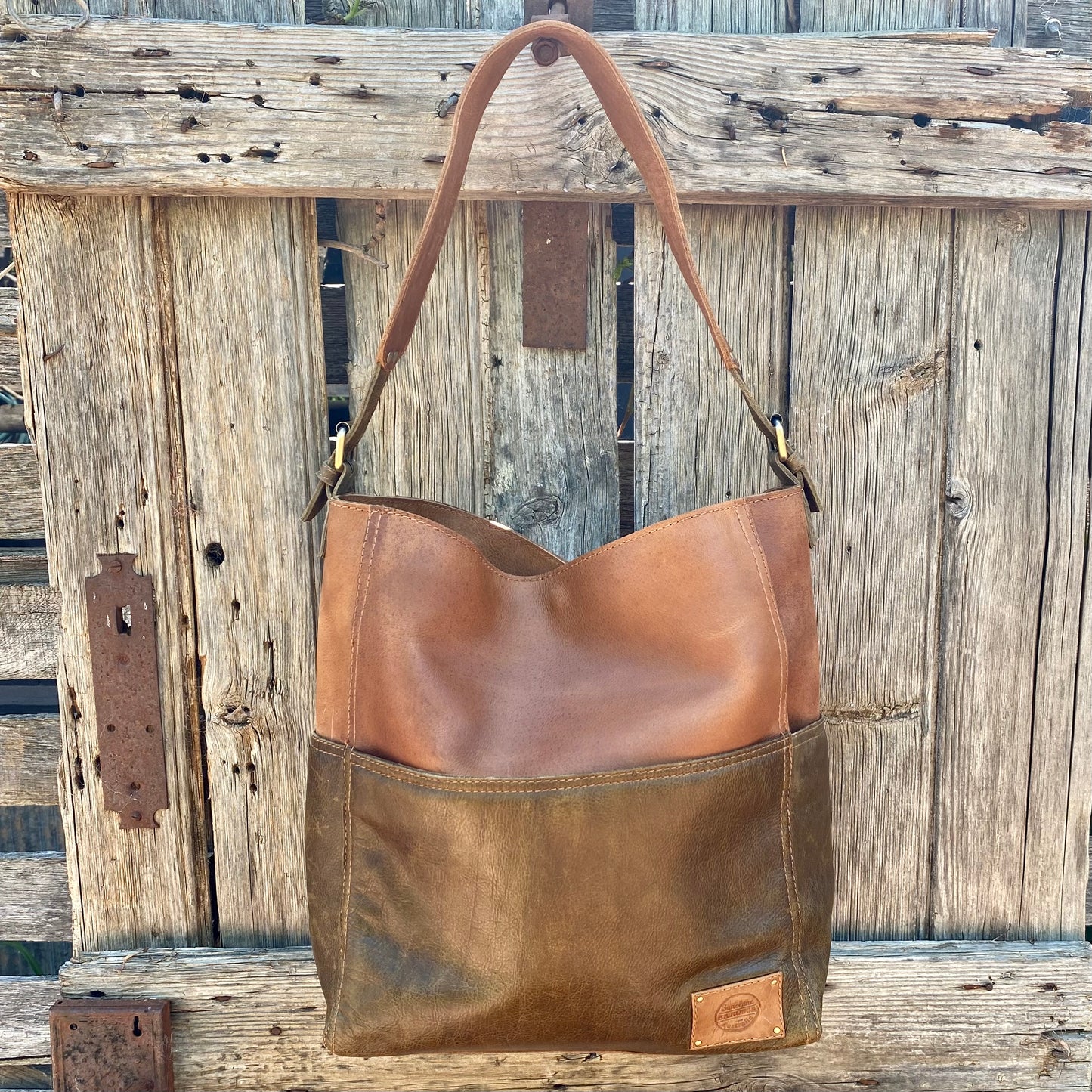 A Four Pocket Leather Tote