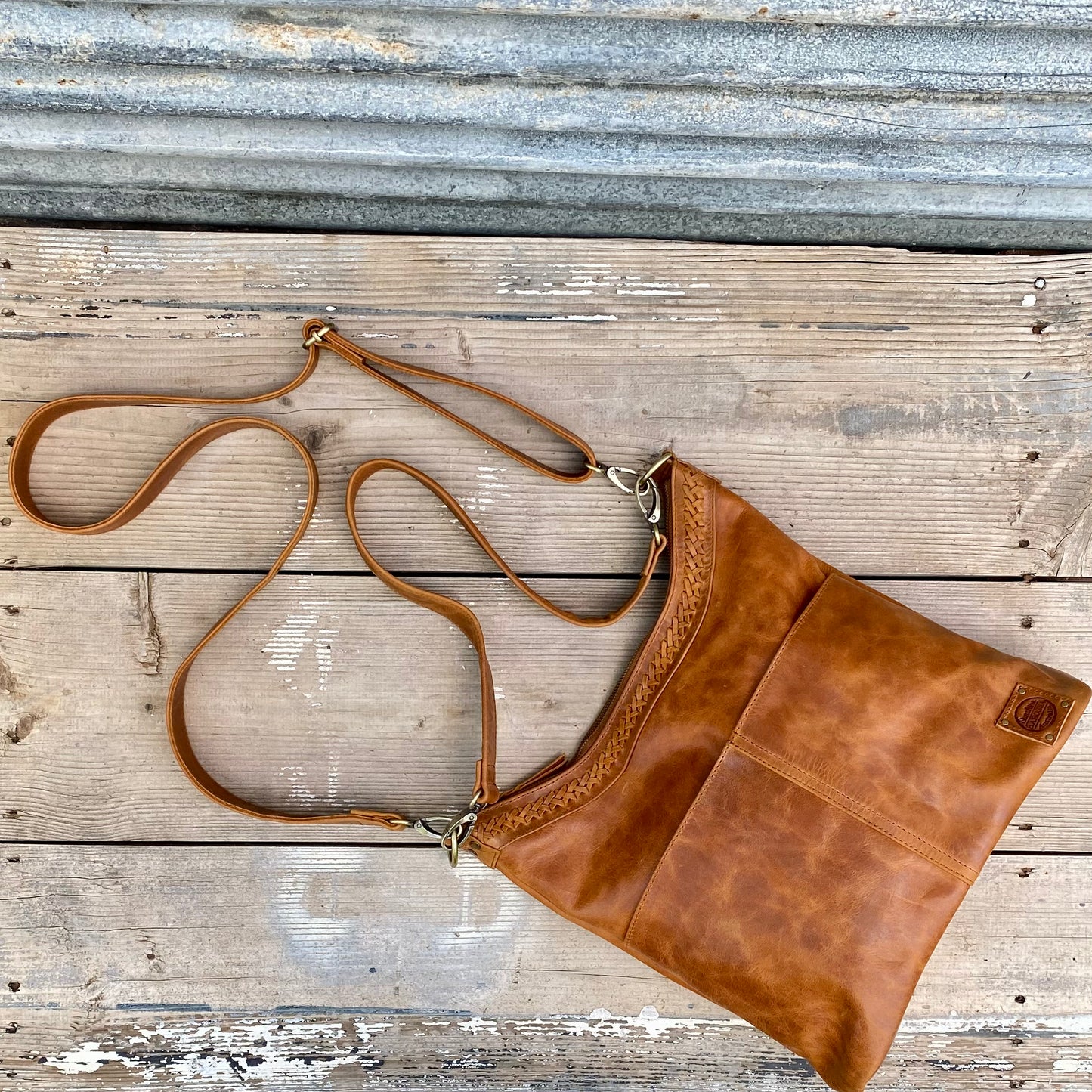A Two Pocket Leather Bucket Bag