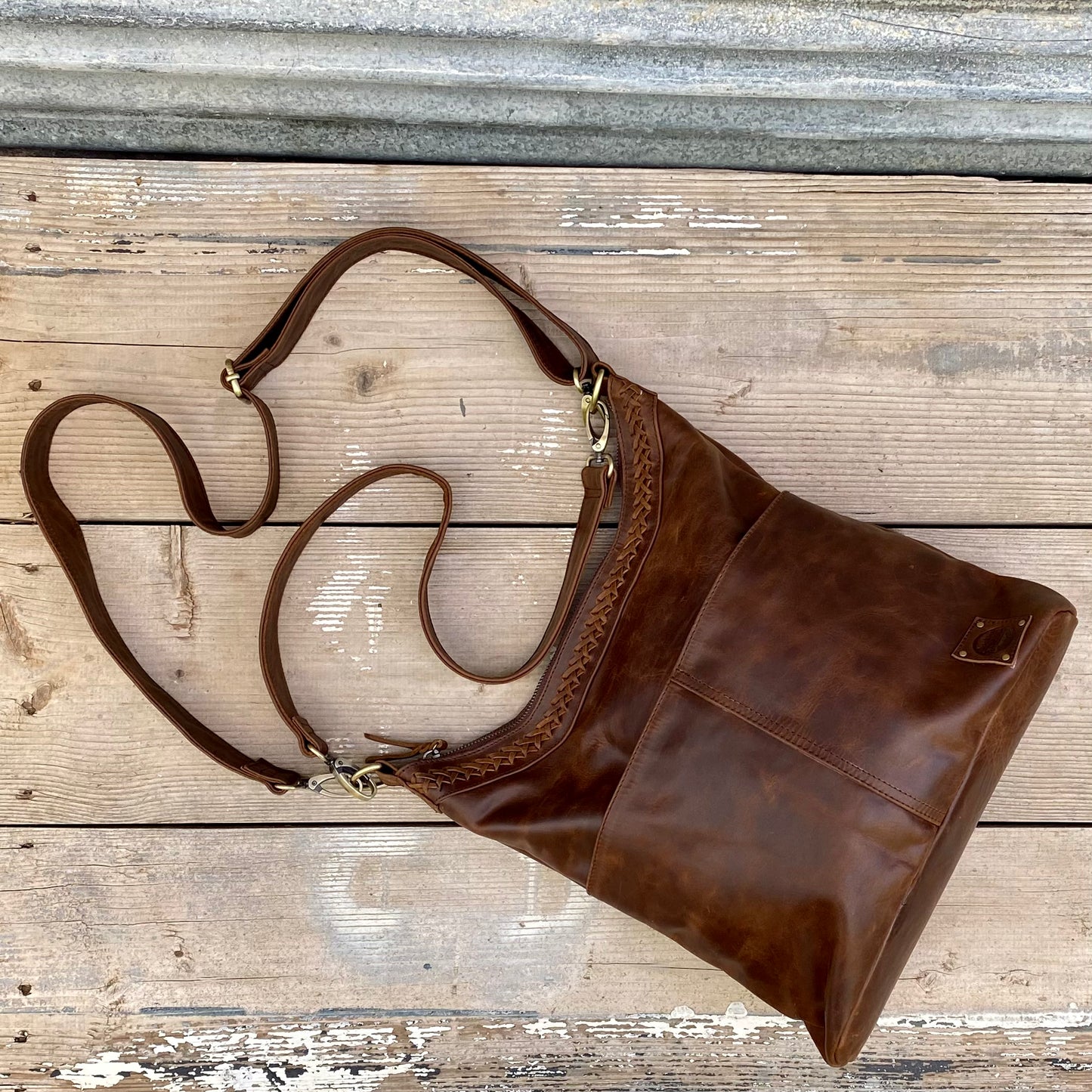 A Two Pocket Leather Bucket Bag