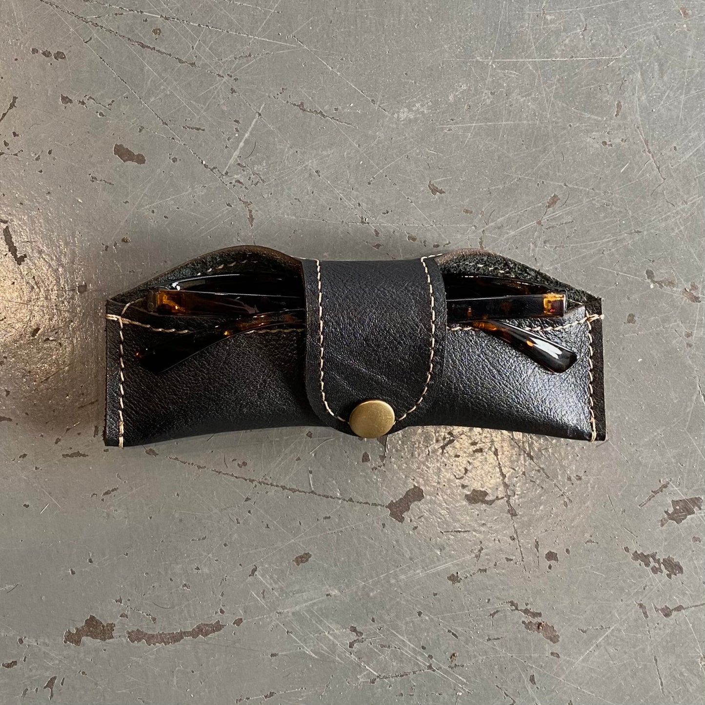 A Thin Leather Snap Lock Glasses Case