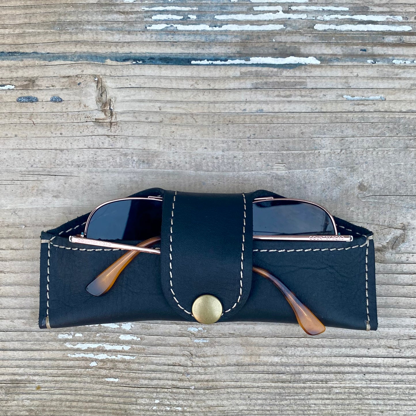 A Thin Leather Snap Lock Glasses Case