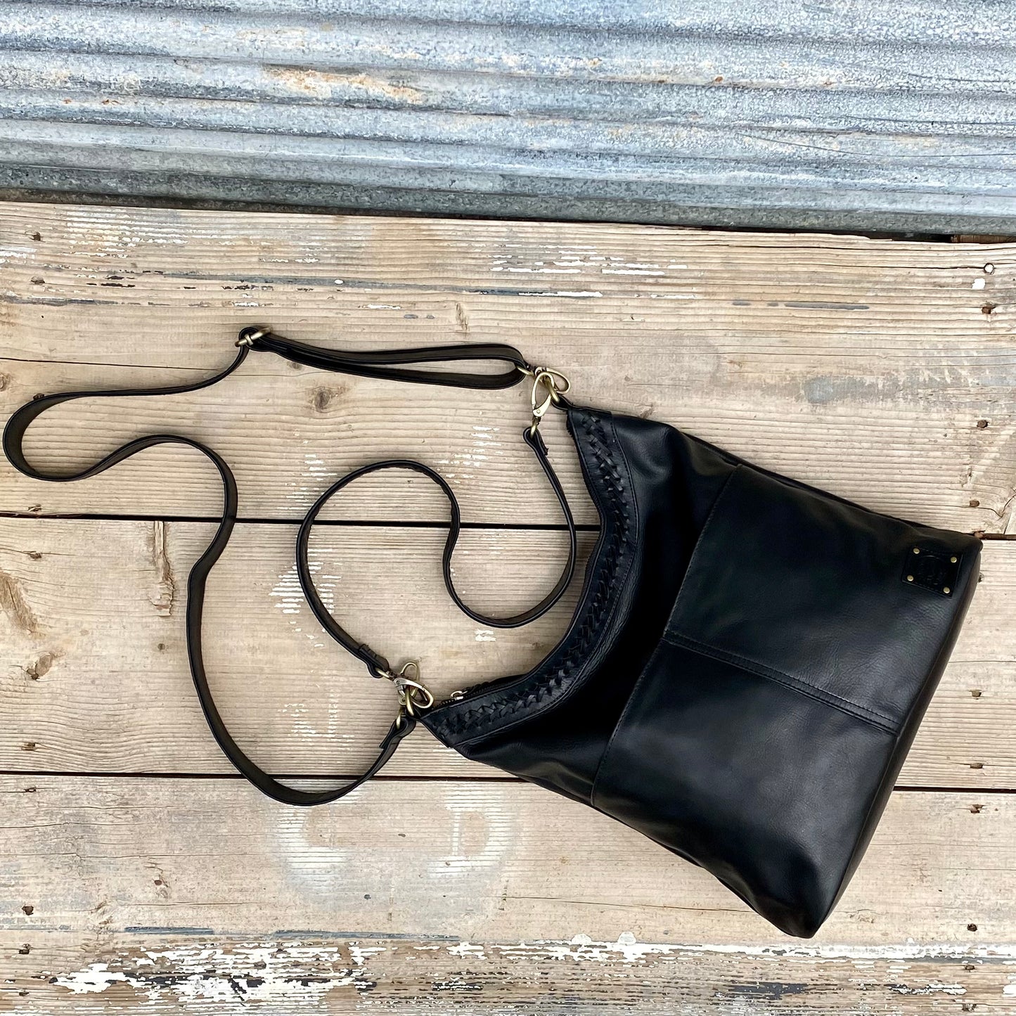 A Two Pocket Leather Bucket Bag