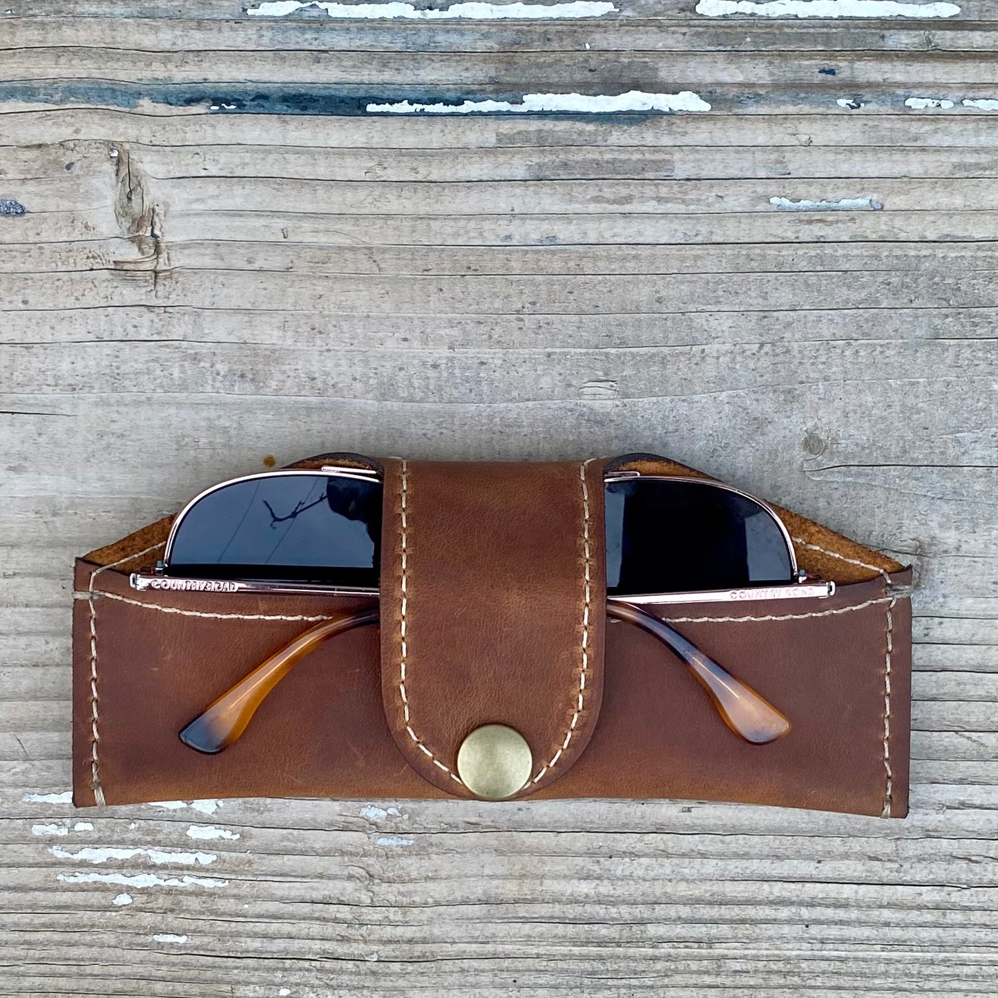 A Thin Leather Snap Lock Glasses Case