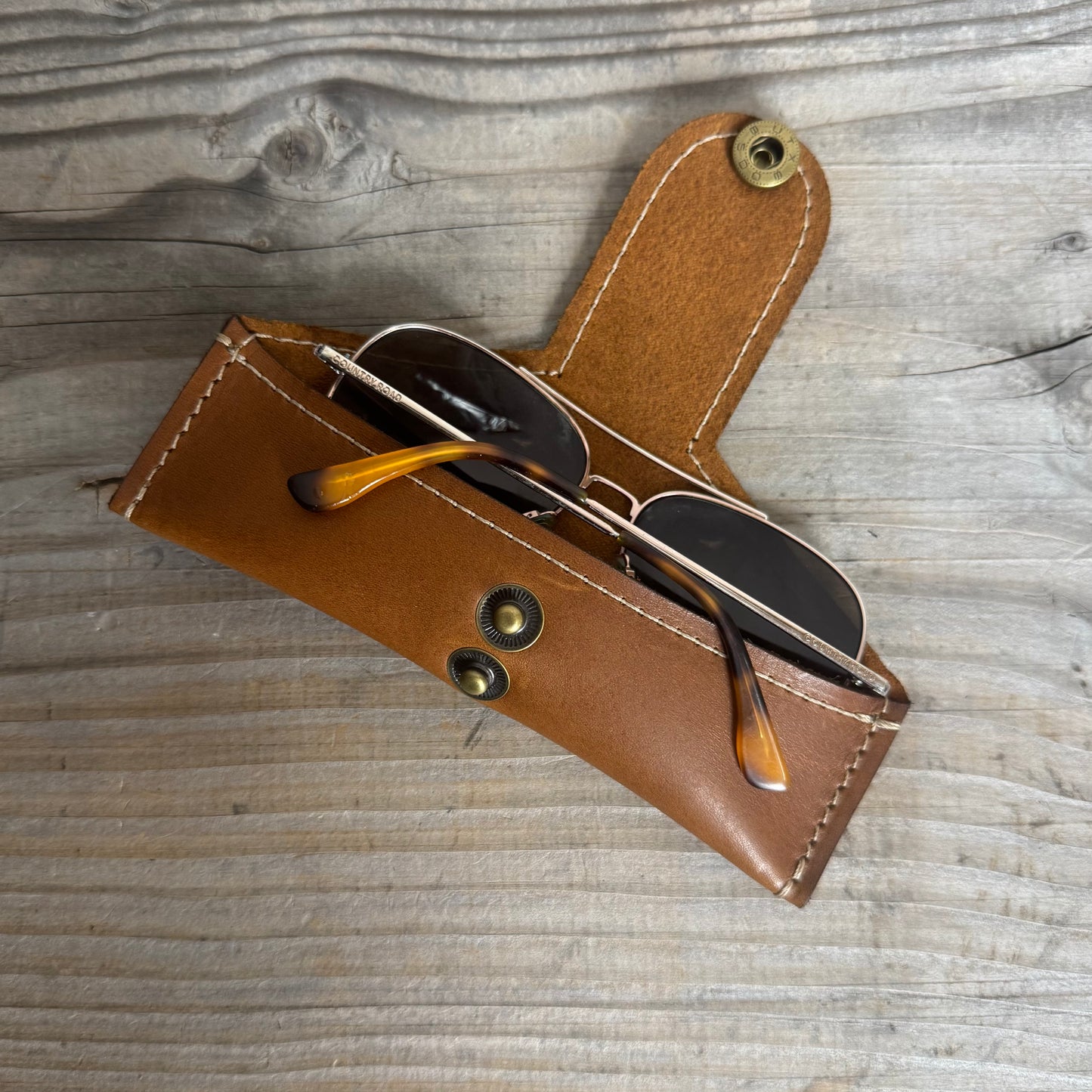 A Thin Leather Snap Lock Glasses Case