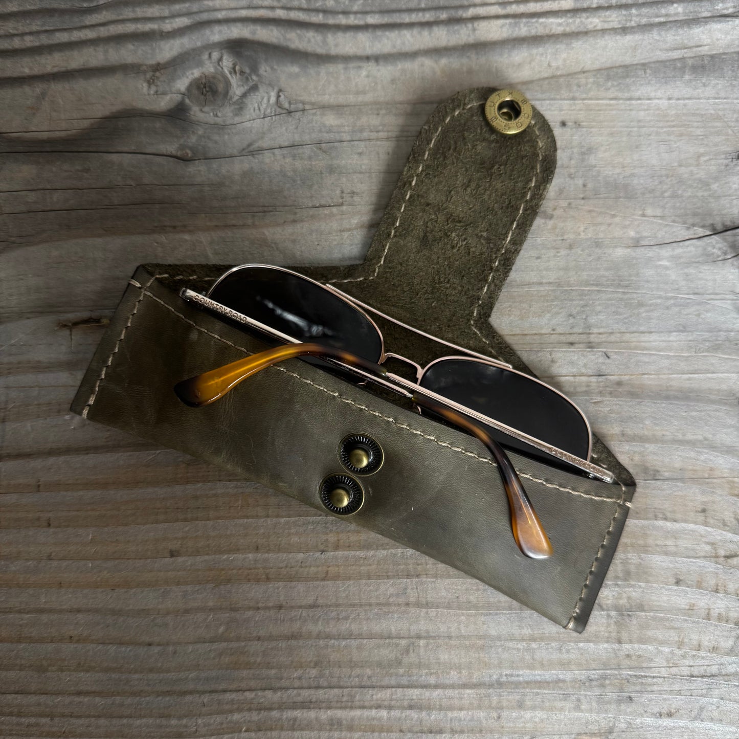 A Thin Leather Snap Lock Glasses Case