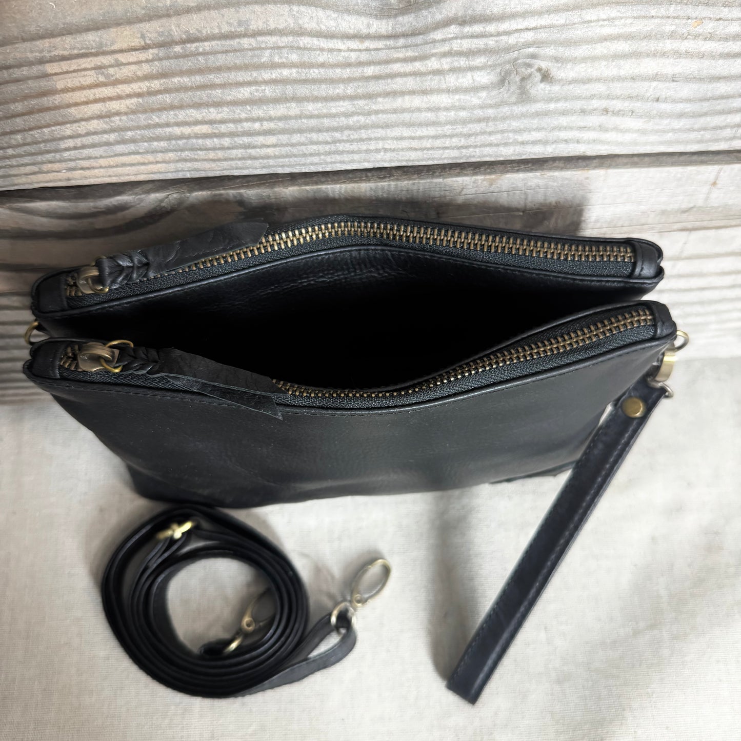 A Leather Double Compartment Clutch