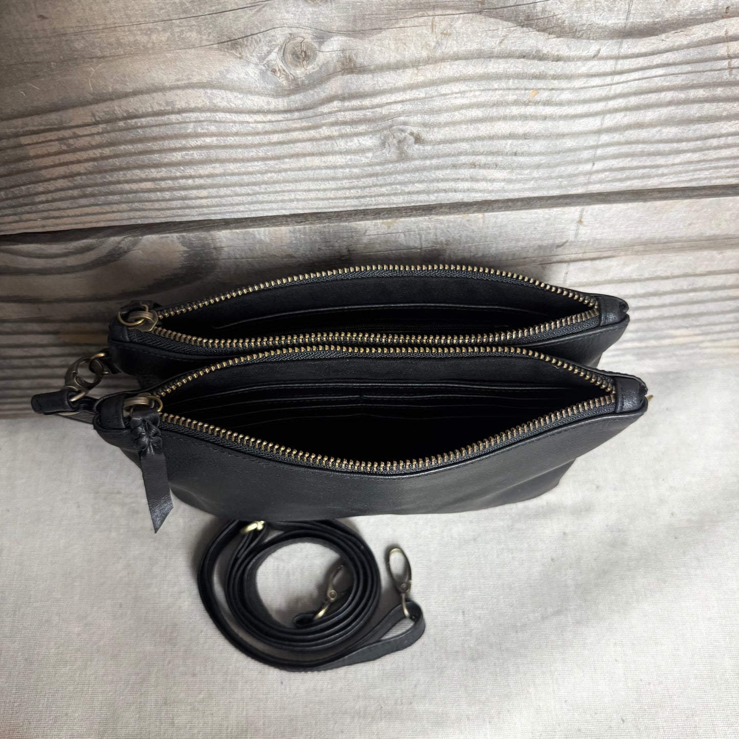 A Leather Double Compartment Clutch