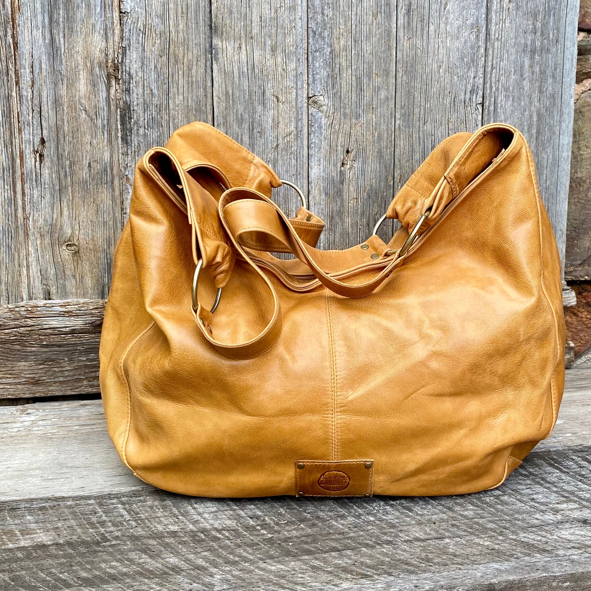 Tan leather slouch bag on sale